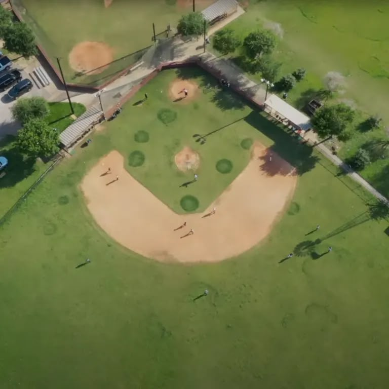 Overhead view of a baseball diamond with players on the field